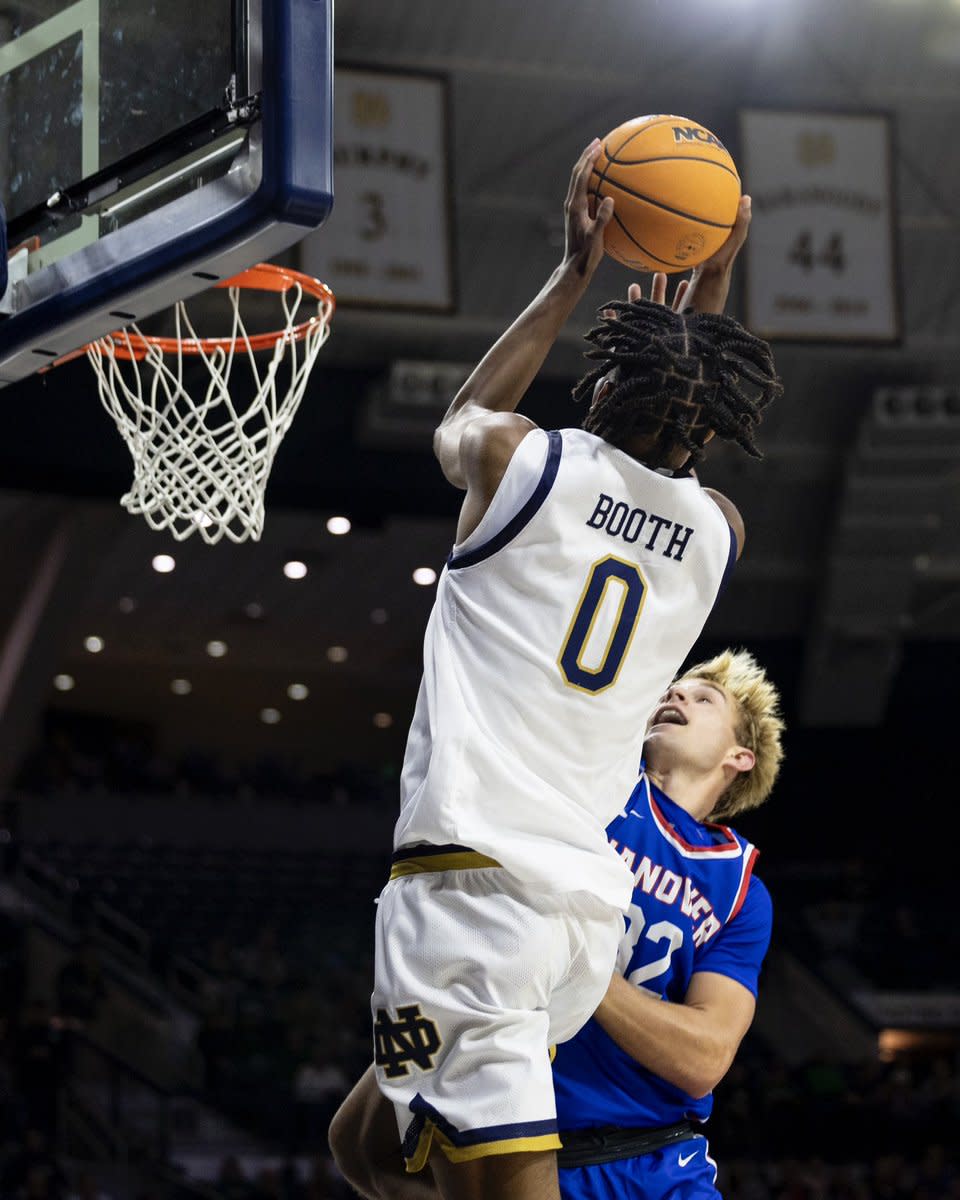 Carey Booth Takes A fading jump shot over pre-season opponent Hanover.   